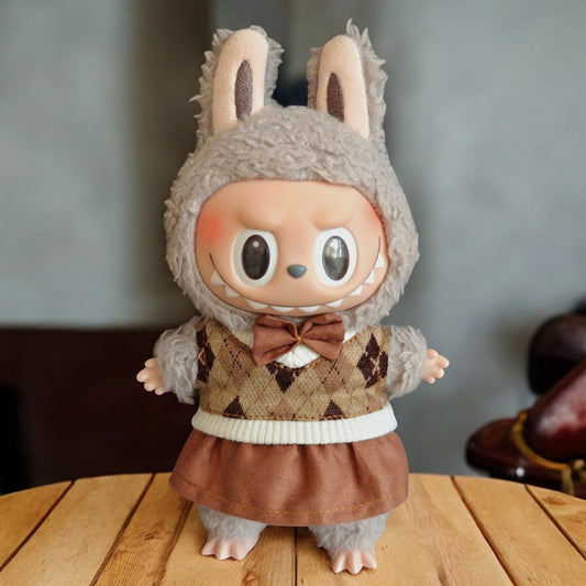 Get your labubu looking stylish with this handmand outfit, featuring a trendy Argyle Pattern design. Fits labubu versions 1, 2, and 3. Ready to ship worldwide with fast shipping. (Labubu figure not included.), Argyle Pattern Style - Handmand Labubu Doll Outfit brown color