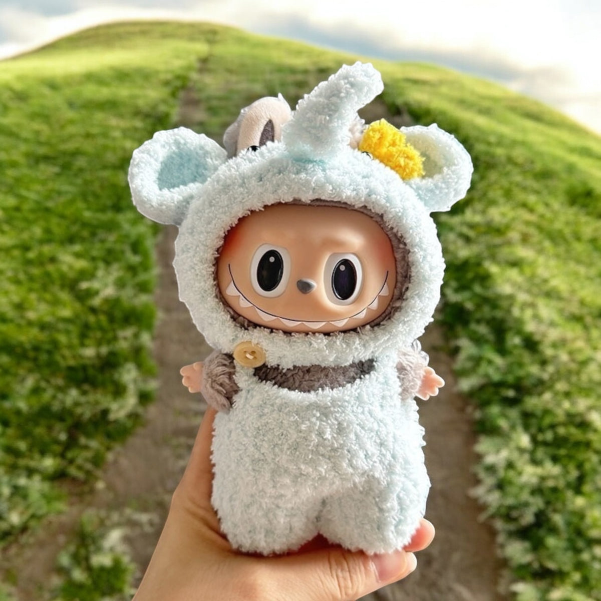 Dress up your Labubu doll in this adorable Cute Elephant costume! Perfect for Labubu versions 1, 2, and 3, this outfit will add a playful touch to your collection. With worldwide shipping and fast delivery, you'll have your Labubu ready for their next adventure in no time. (Labubu figure not included.), Cute Elephant costume style - Handmand Labubu Doll Outfit