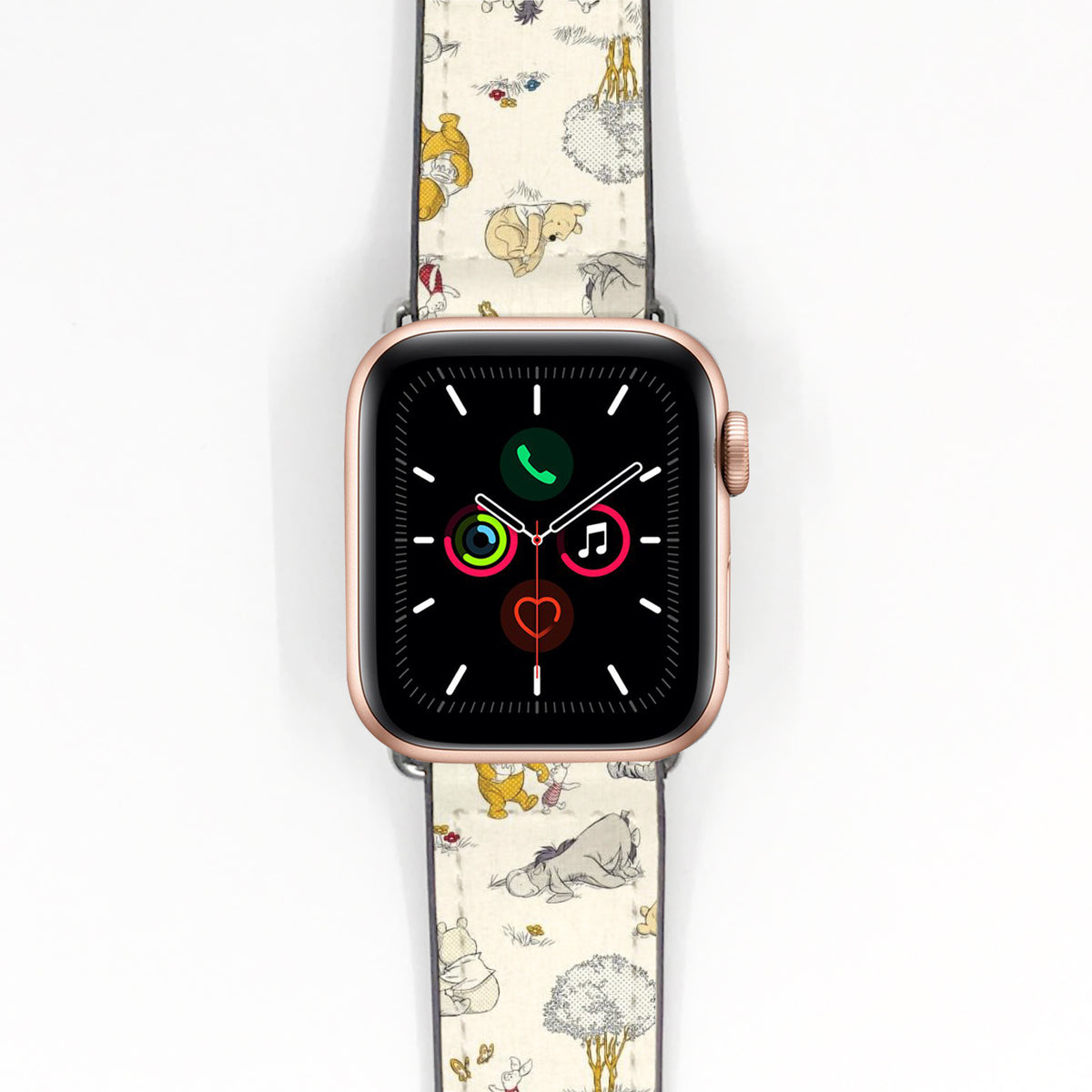 Cream Winnie the Pooh printed Apple Watch band displayed on a rose gold smartwatch.