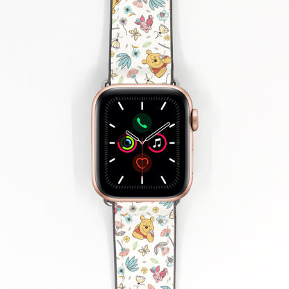 Cream Winnie the Pooh floral Apple Watch band displayed on a rose gold smartwatch.