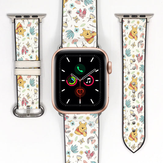 Winnie the Pooh and Piglet Apple Watch band displayed with the watch and both strap pieces on a white background.