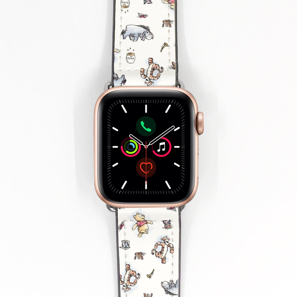 Cream Winnie the Pooh character-print Apple Watch band displayed on a rose gold smartwatch.