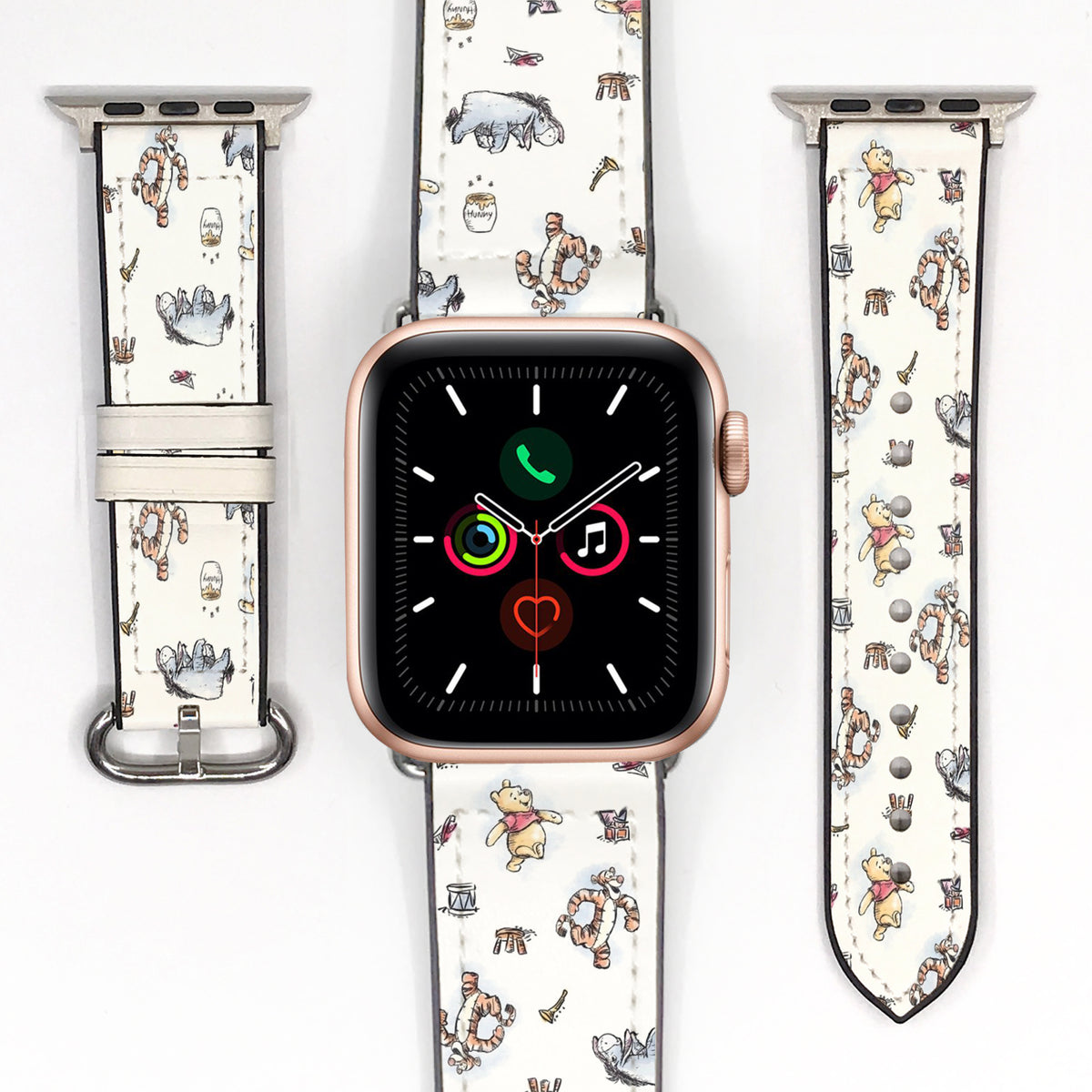 Cream cartoon character Apple Watch band displayed with the watch and both strap pieces on a white background.