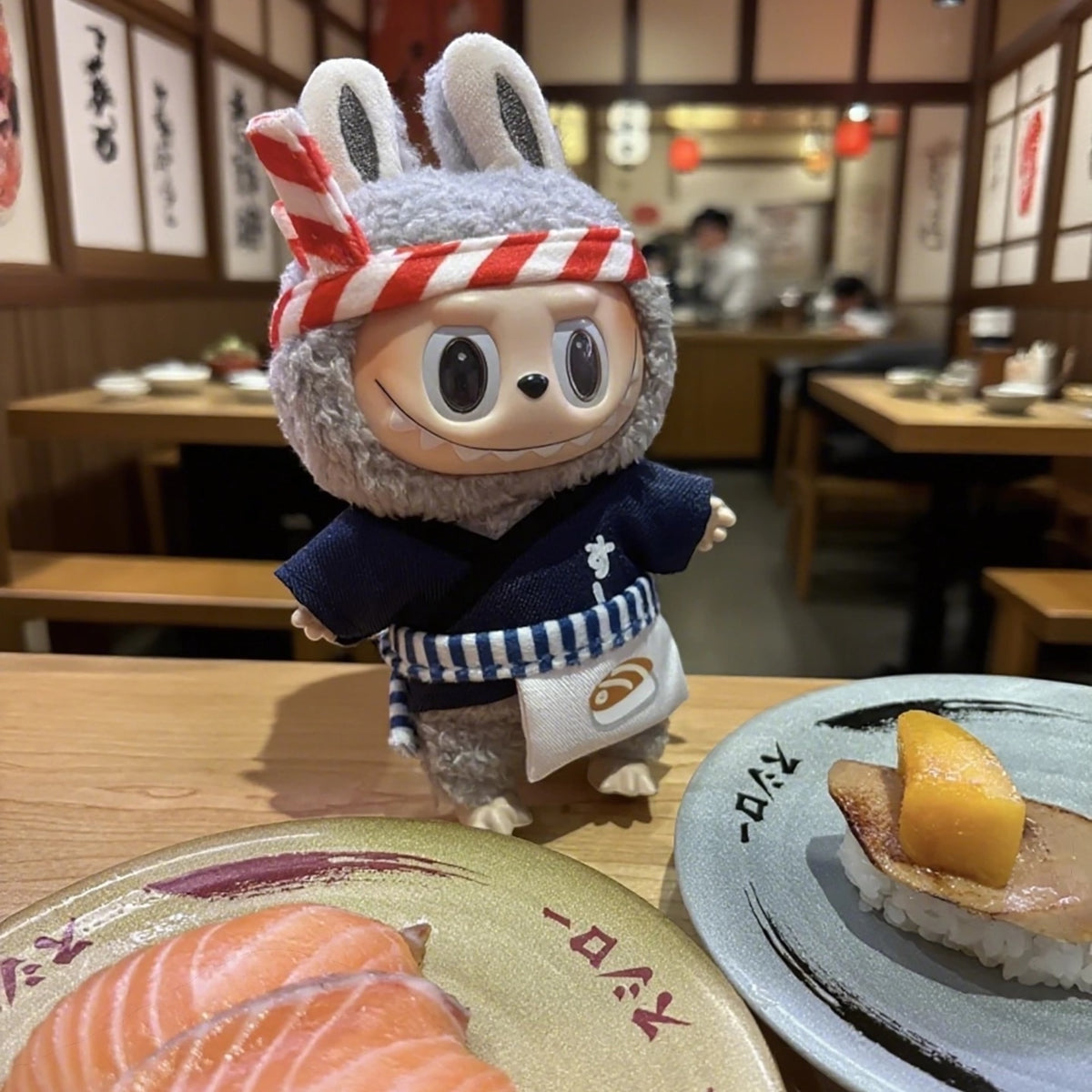 Labubu Doll wearing a Japanese Sushi Chef outfits in the Japan Sushi Shop