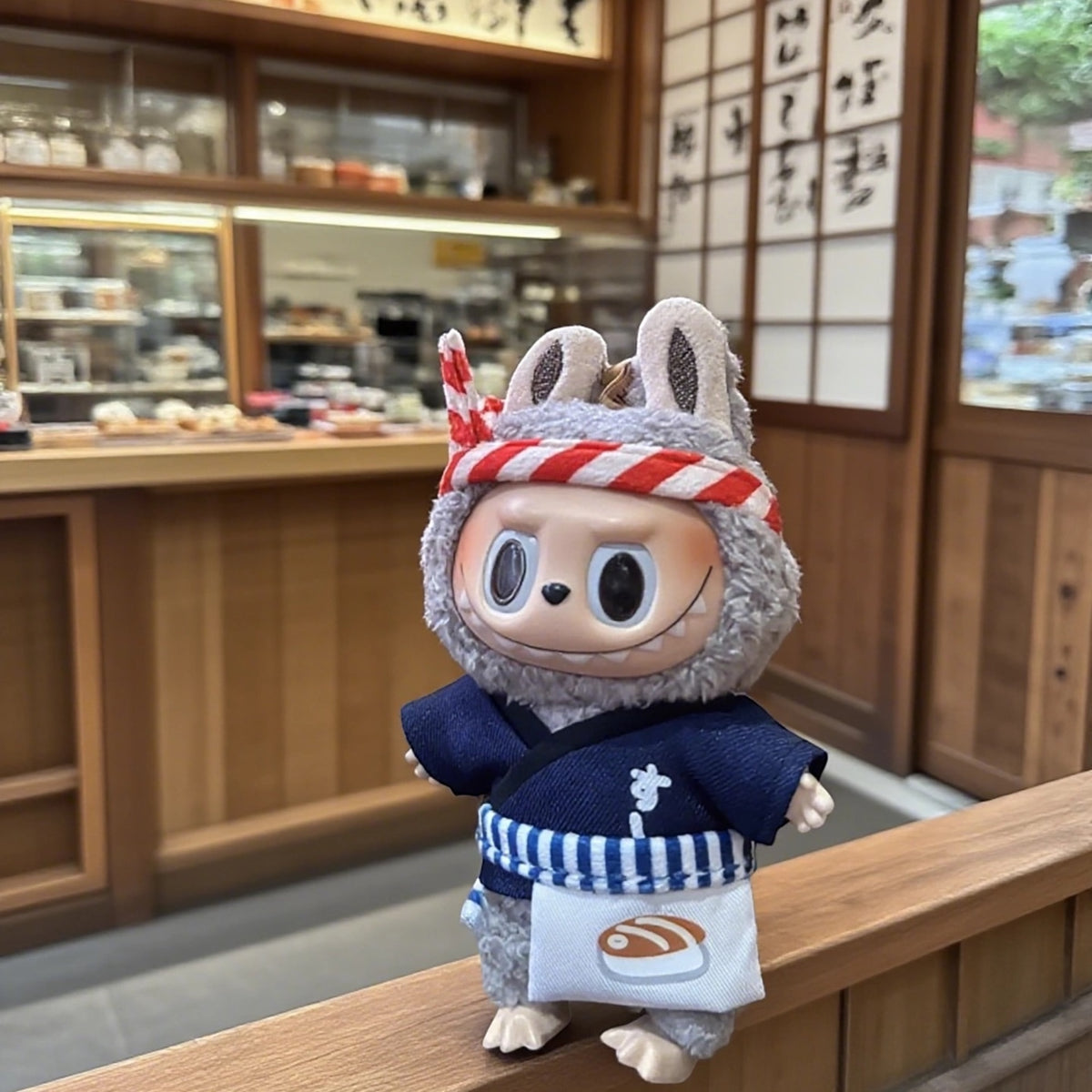 Labubu Doll wearing a Japanese Sushi Chef outfits in the Japan Sushi Shop