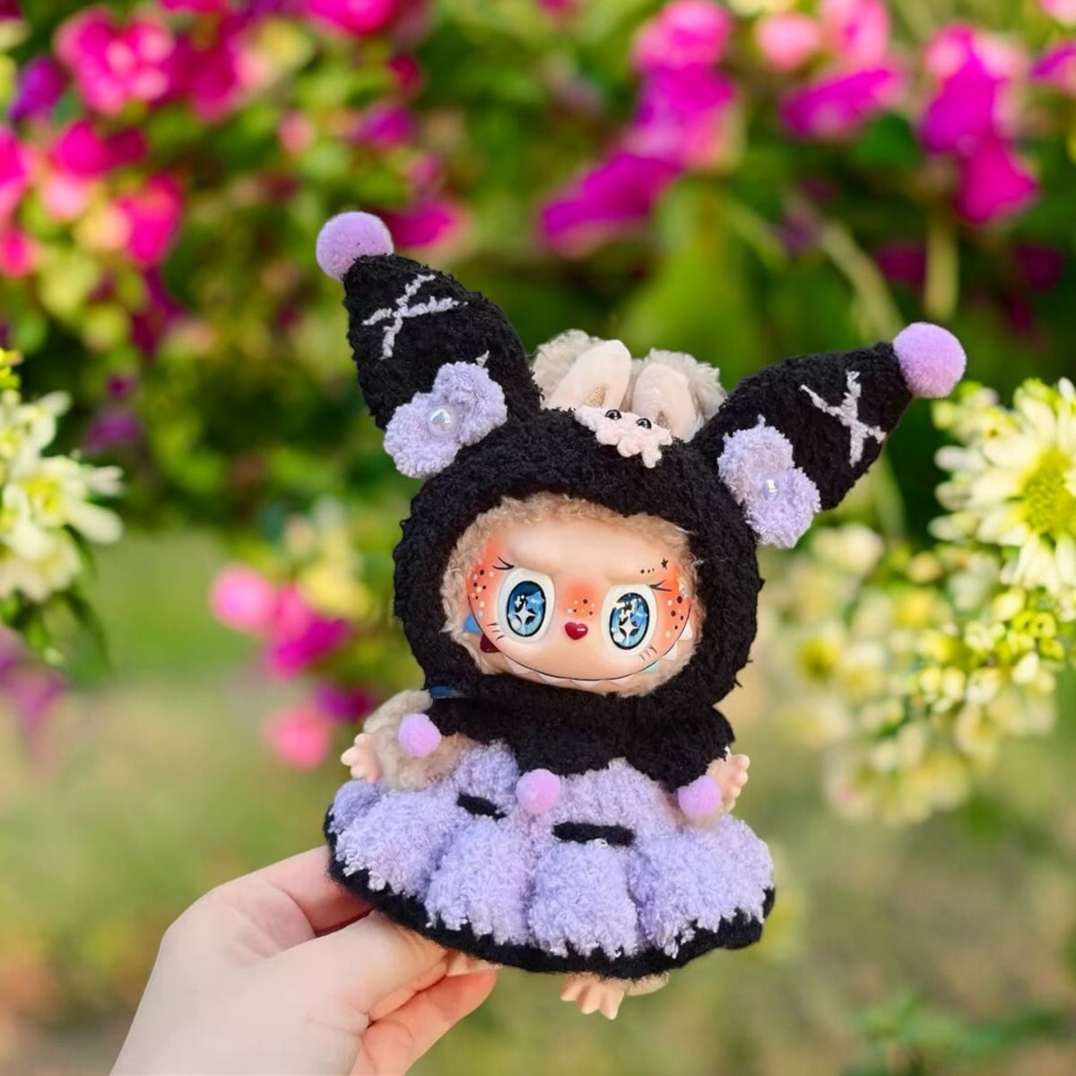 Transform your Labubu figure into the ultimate fashion icon with this handmade Black Purple Kuromi costume! Perfect for versions 1, 2, and 3, this outfit is sure to make a statement. And with worldwide shipping and fast delivery, you can start showing off your unique style in no time. (Labubu figure not included - costume only!), Black Purple Kuromi costum style - Handmand Labubu Doll Outfit