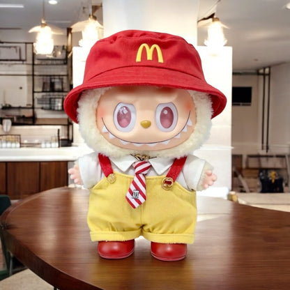 Labubu 17cm Doll Keychain wearing a Fast Food Worker costume with red hat featuring the McDonald's logo on a wooden table.