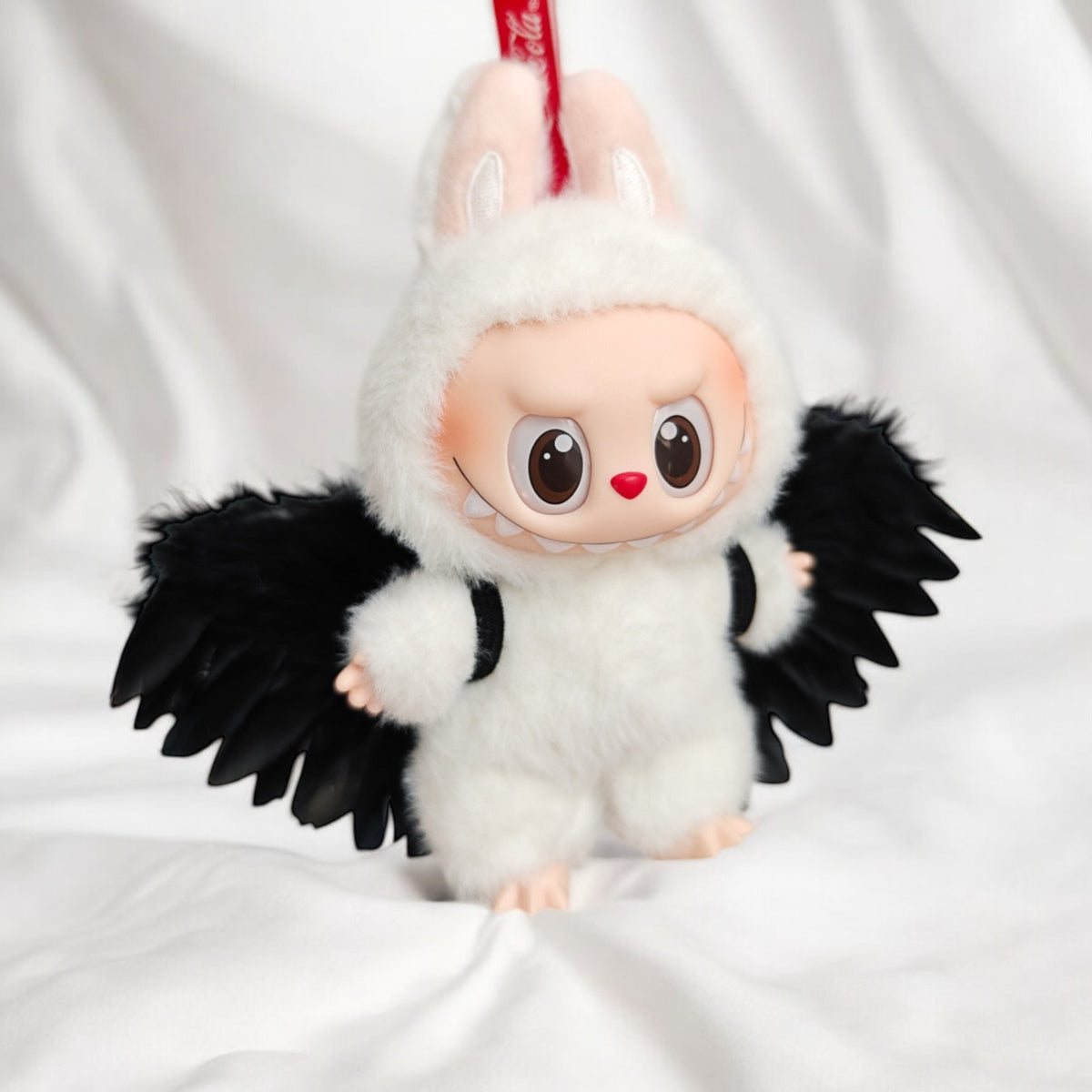Elevate your Labubu doll's look with these handmade Angel Wings! Compatible with version 1, 2, and 3 of the Labubu outfit, you can now bring your doll's fantasies to life. Fast shipping available for worldwide orders. (Labubu figure not included).