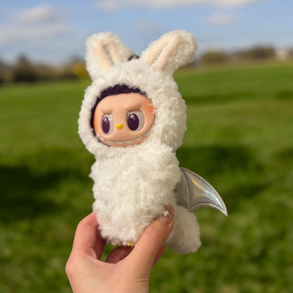 Dress up your labubu figure in this quirky White Dinosaur Zimomo style outfit! Perfect for versions 1, 2, and 3, this costume will make your labubu stand out. Worldwide shipping available with fast delivery. (Labubu figure not included.)